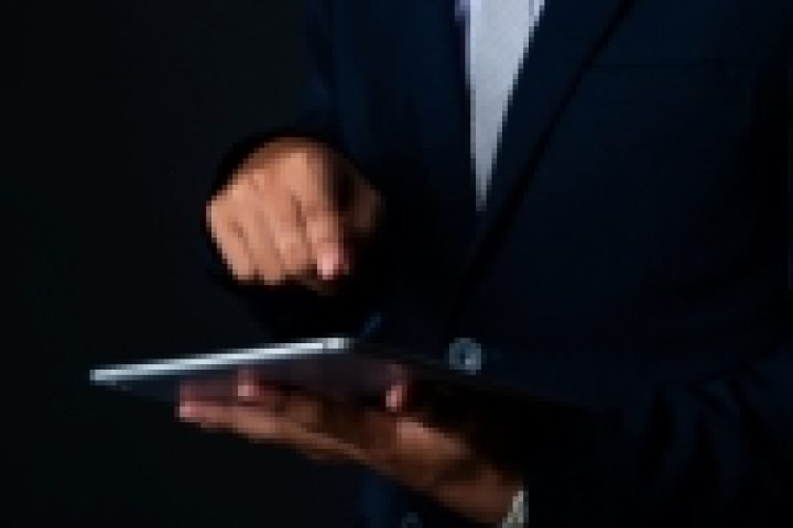 businessman-using-tablet-analyzing-sales-data-economic-growth-graph-chart-technology-150x150-1
