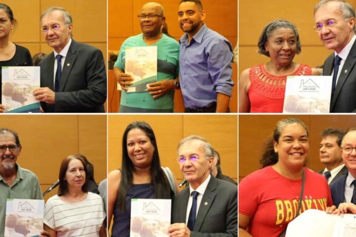 Famílias recebendo títulos imobiliários. (Reprodução, TJMS) — Foto: Famílias rec
